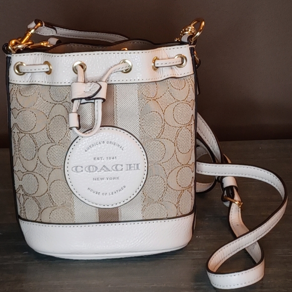 Coach Handbags - COACH Cream and Tan Crossbody Bag